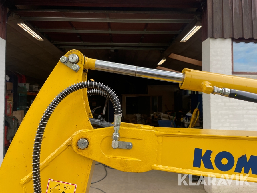Minigraver Komatsu PC16R med skovle