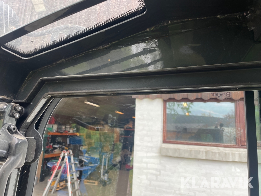 Minigraver Komatsu PC16R med skovle