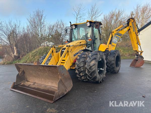 Rendegraver Komatsi WB97S-5 med tvillingehjul og tilbehør