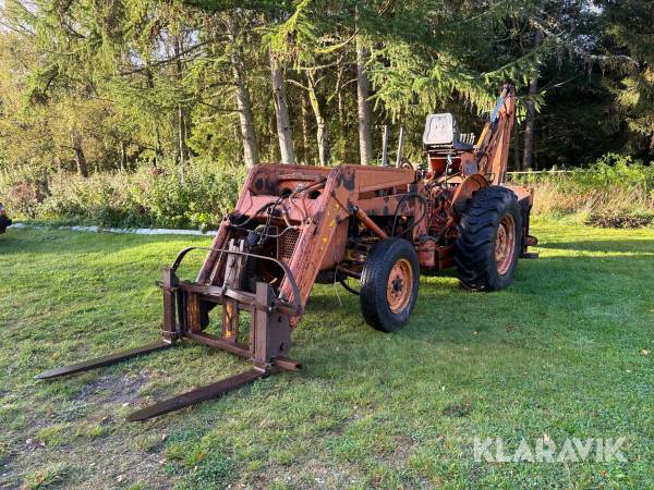 Traktor Massey Ferguson 203C med frontlift og gravearm