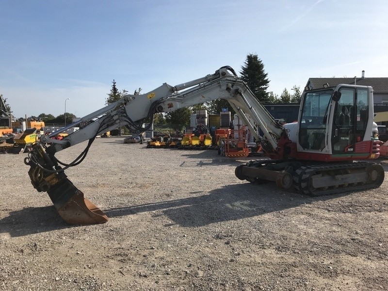 Gravemaskine med skinnehjul