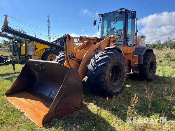 Gummiged Case 721E med skovl
